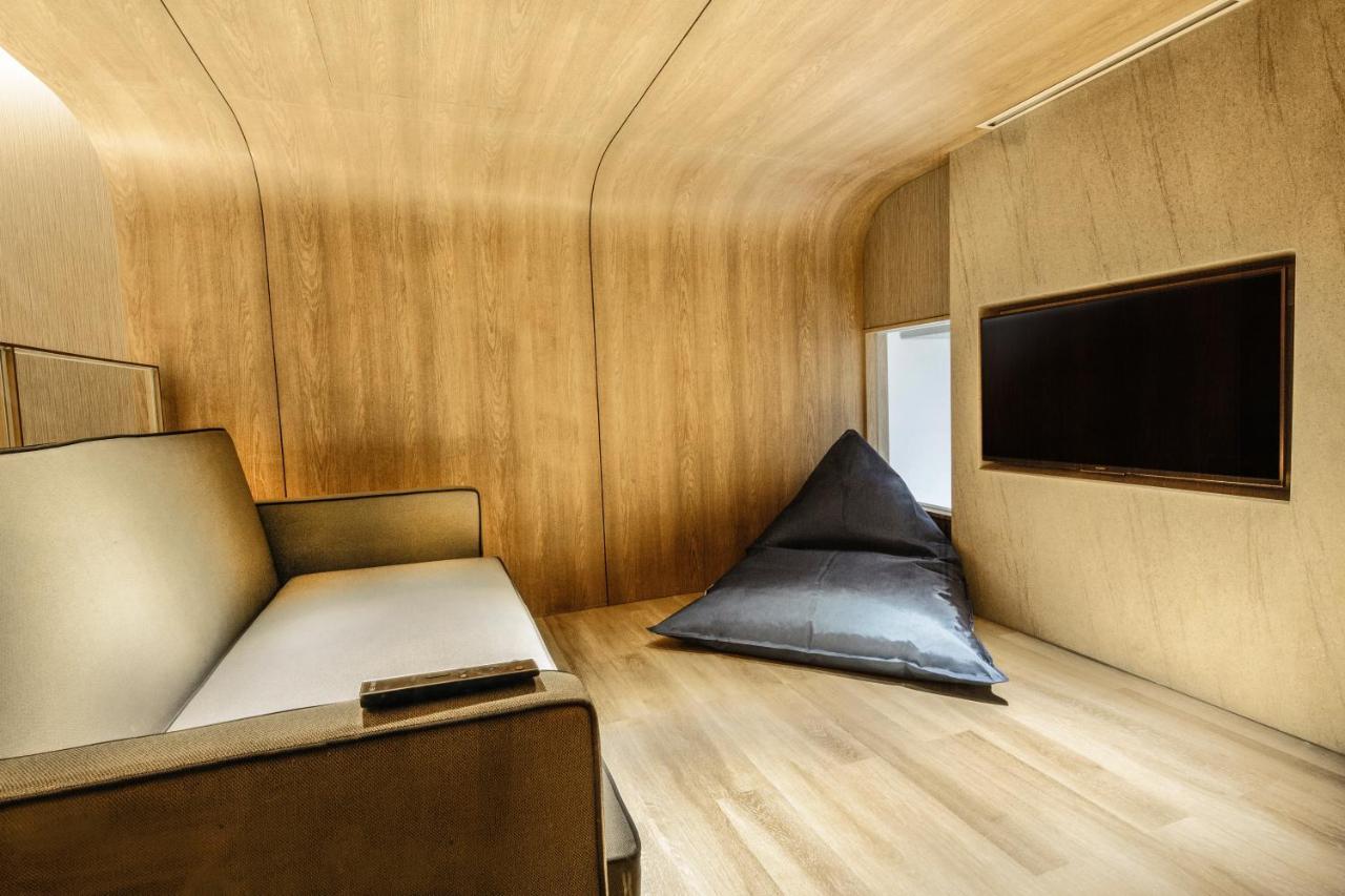 The Botanica Sanctuary Hotel Puncak Exterior photo Interior of a capsule hotel